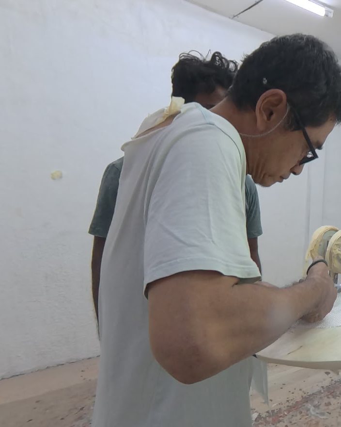 A KAYU shaper at work in the Canggu shaping bay