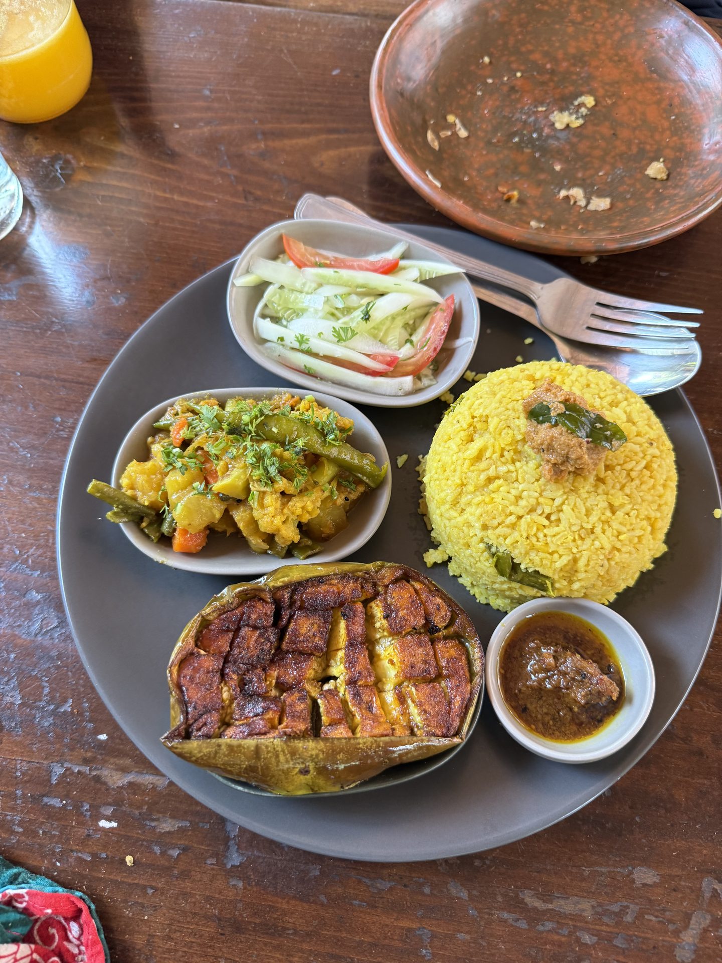 Local seafood plate with rice and vegetables