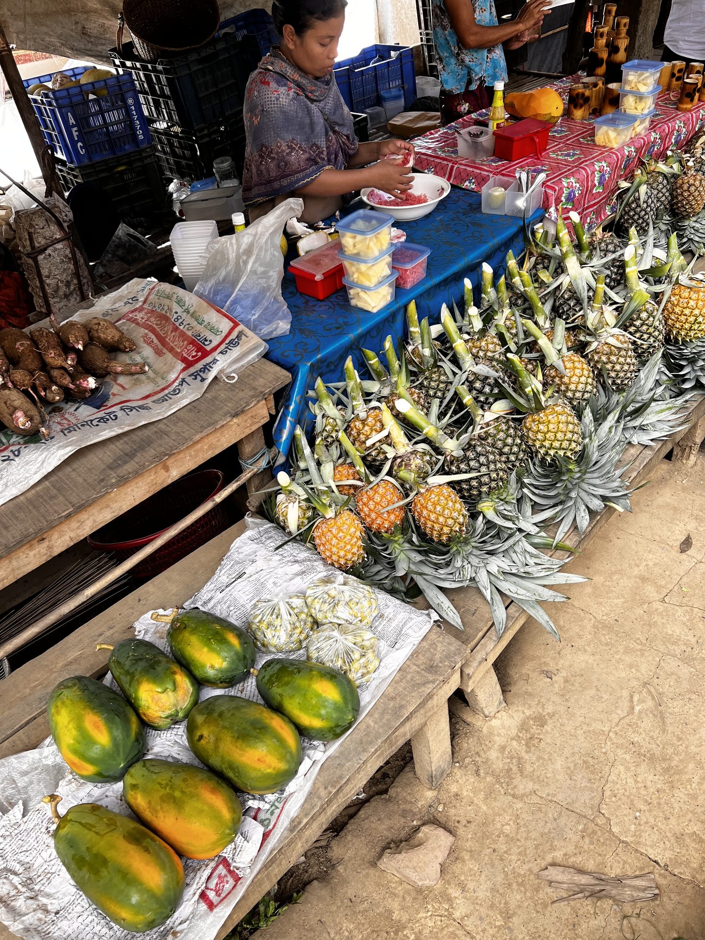 Fruit seller at a roadside market near Cox's Bazar